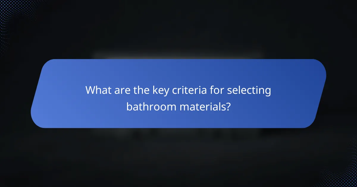 What are the key criteria for selecting bathroom materials?